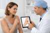 Patient discussing upper-arm contouring options with a surgeon