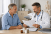 Patient and clinician reviewing bariatric follow-up records